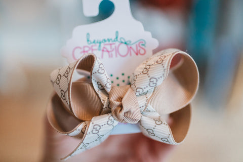 Layered Medium Bow **Gucci